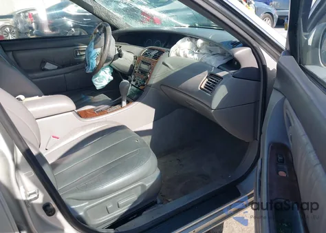 2001 Toyota Avalon Xl/Xls z USA, uszkodzony, nr VIN 4T1BF28B11U188655